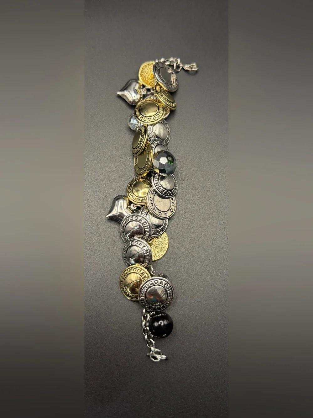 Coach vintage Two-Tone Coin Charm Bracelet in Gold and Silver
